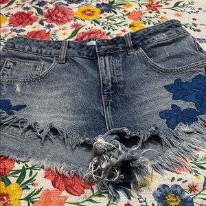 Denim Frayed Hem Shorts with Blue Floral Accents